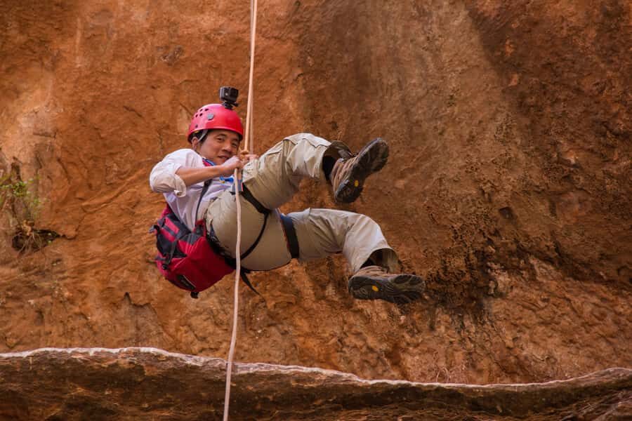 From Moab: Rock of Ages Moderate Rappelling Obstacle Course - Inside the slot: potholes and footing in a narrow world