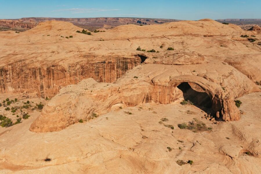 Moab: Corona Arch Canyon Run Helicopter Tour - From Determination Towers to Gemini Bridges: the first aerial hit